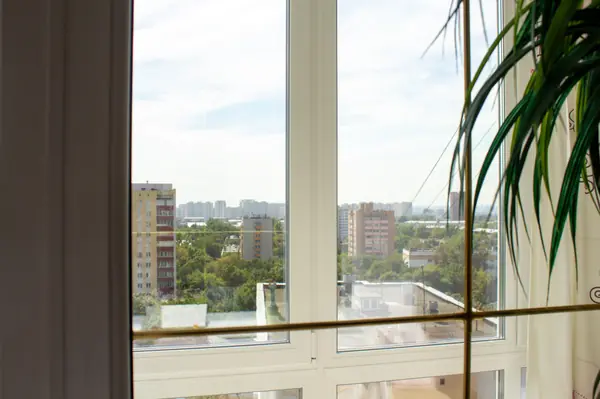 Панорамное остекление балкона и кухонное окно