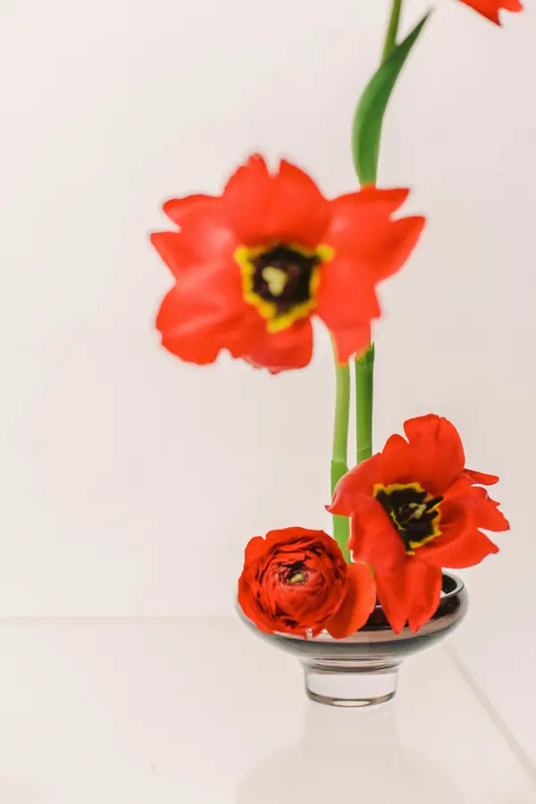 Flower arrangements in an&angel glass