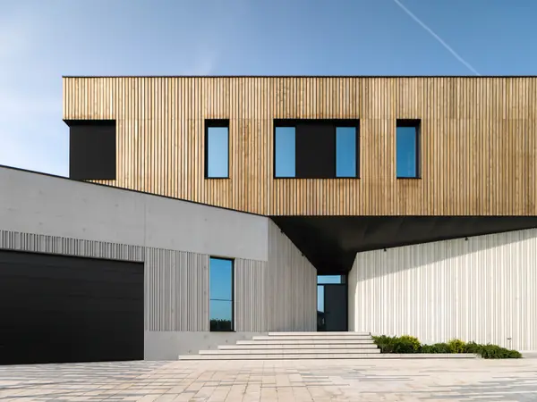 Дом из архитектурного бетона в поселке “Миллениум Парк”