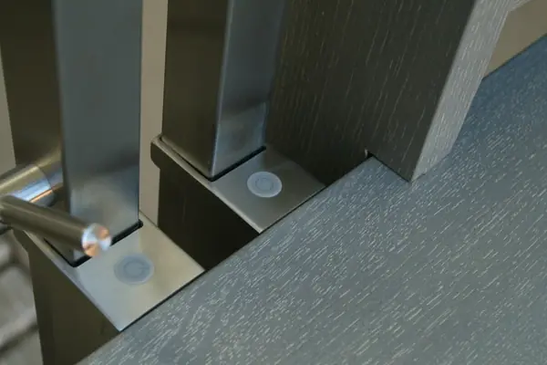 Modern metal stair covered by patina oak