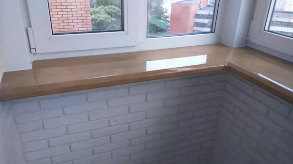 Замена остекления, утепление и отделка балкона декоративным камнем