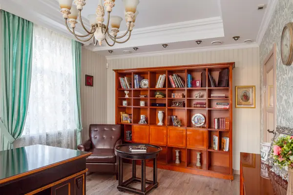 Двухэтажный дом с цокольным этажом и мансардой