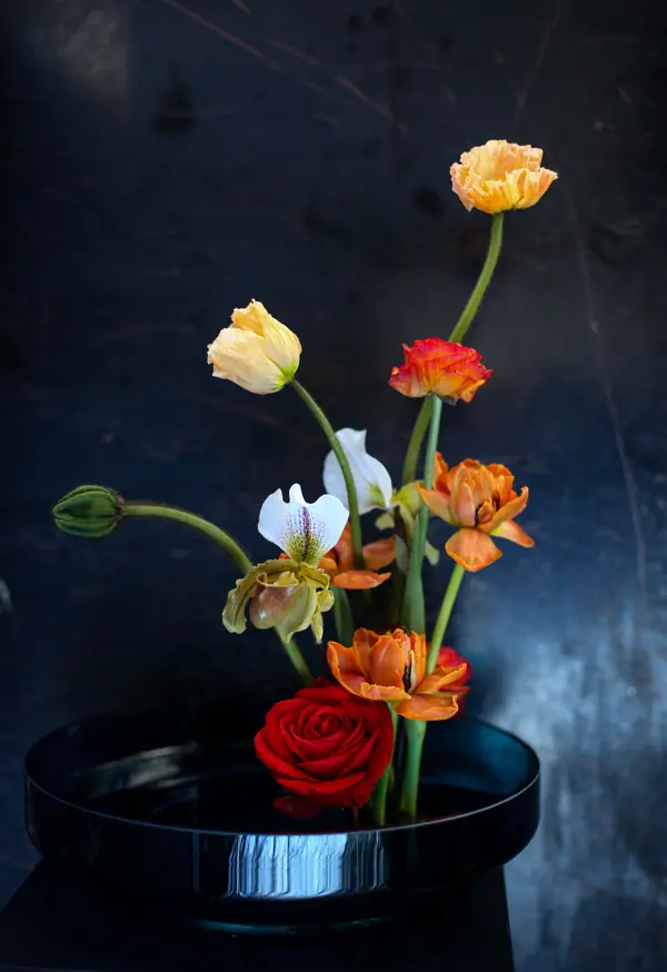 Flower arrangements in an&angel glass