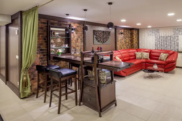 Двухэтажный дом с цокольным этажом и мансардой