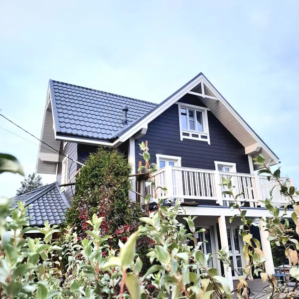 Деревянный загородный дом после реконструкции