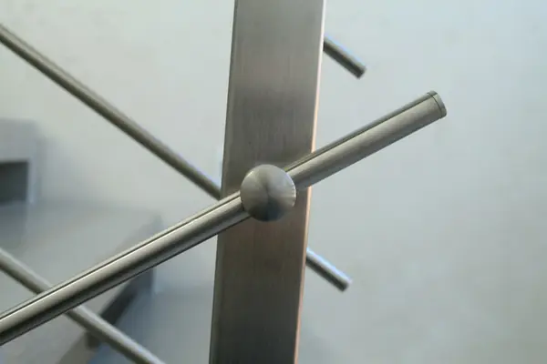 Modern metal stair covered by patina oak