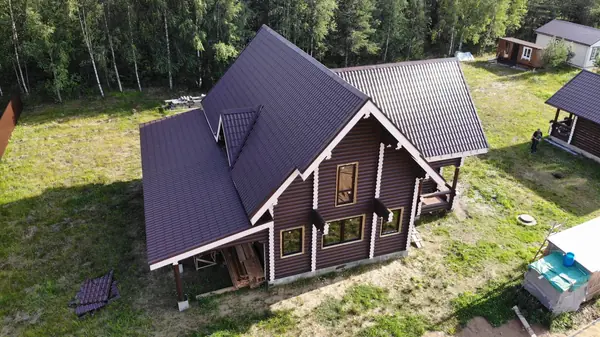 Сказочный дом из оцилиндрованного бревна.