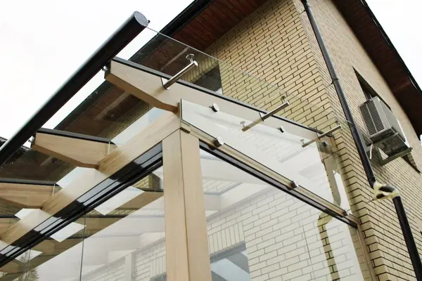 Терраса из бруса с раздвижным остеклением