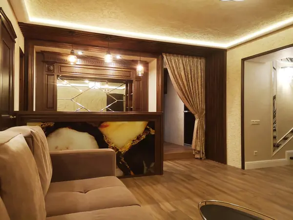 Фото готового интерьера. Цокольный этаж загородного дома, зона для отдыха