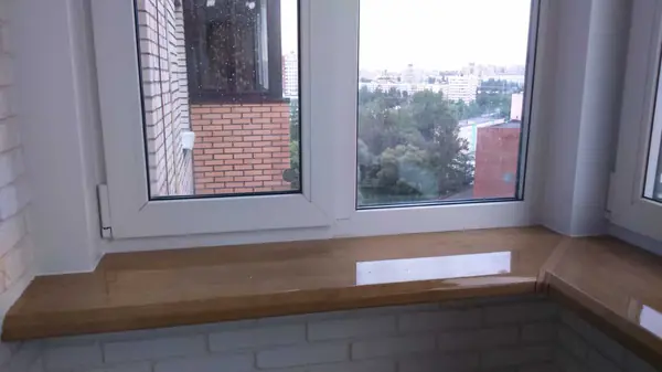 Замена остекления, утепление и отделка балкона декоративным камнем