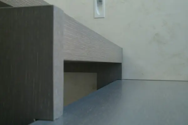 Modern metal stair covered by patina oak