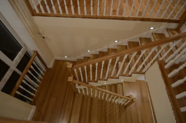 Wood cladding of a concrete stair
