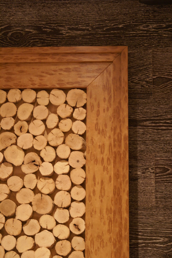Burl Eucalyptus veneered  wine cabinet, wall decor and ceiling moldings.