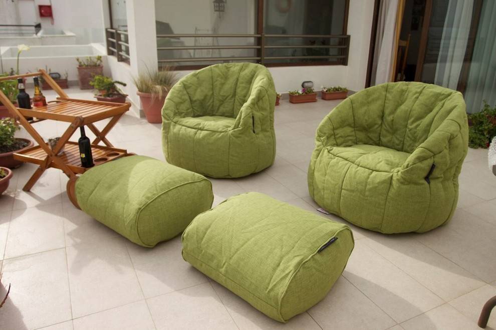 Более 10 лет дизайнерское бескаркасное кресло Butterfly Sofa™ и пуф Ottoman™ явл
