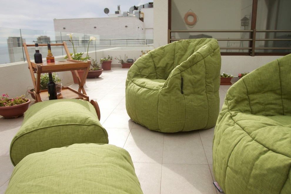 Более 10 лет дизайнерское бескаркасное кресло Butterfly Sofa™ и пуф Ottoman™ явл