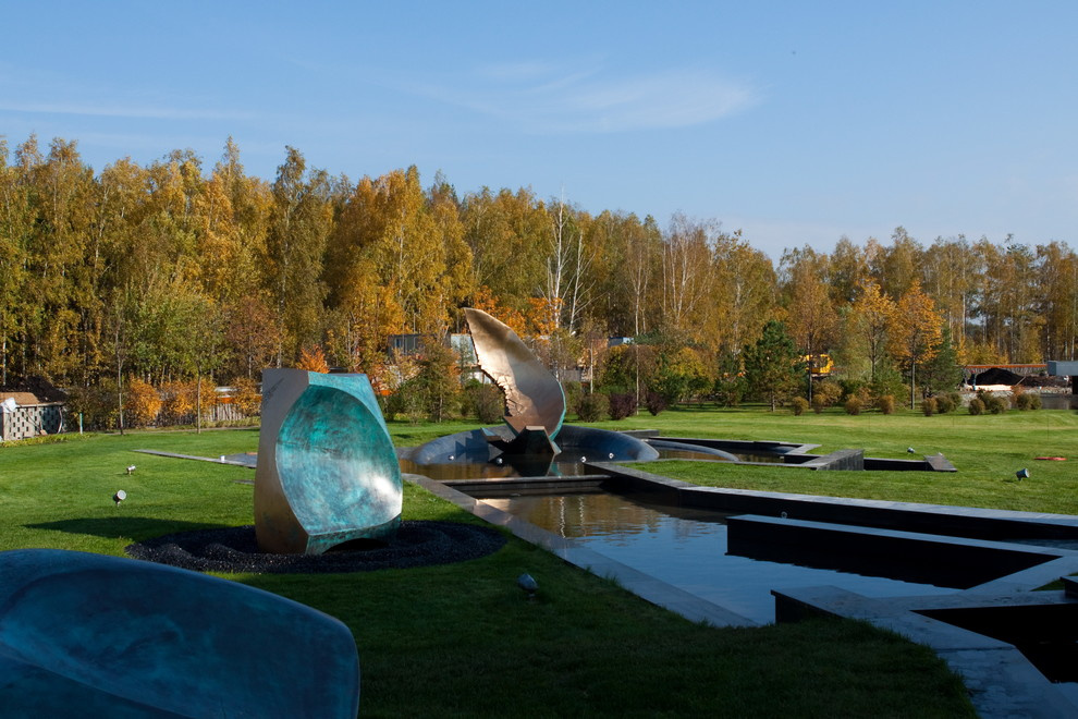 Проект недели: Современный сад с холмами и «метеоритом»