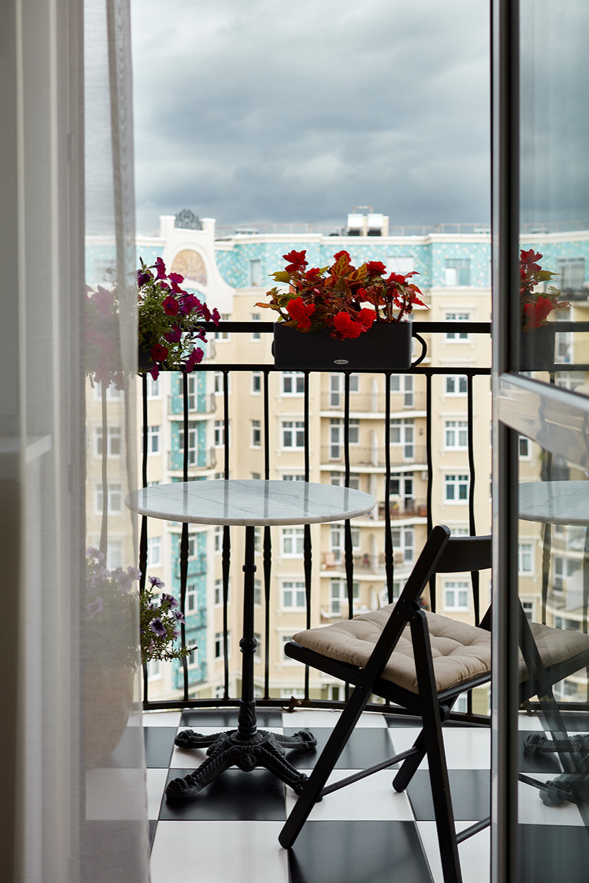 В гостях: Квартира с камином и открытым балконом