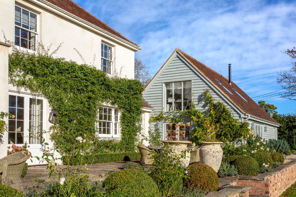 Вопрос: В какой цвет покрасить дом