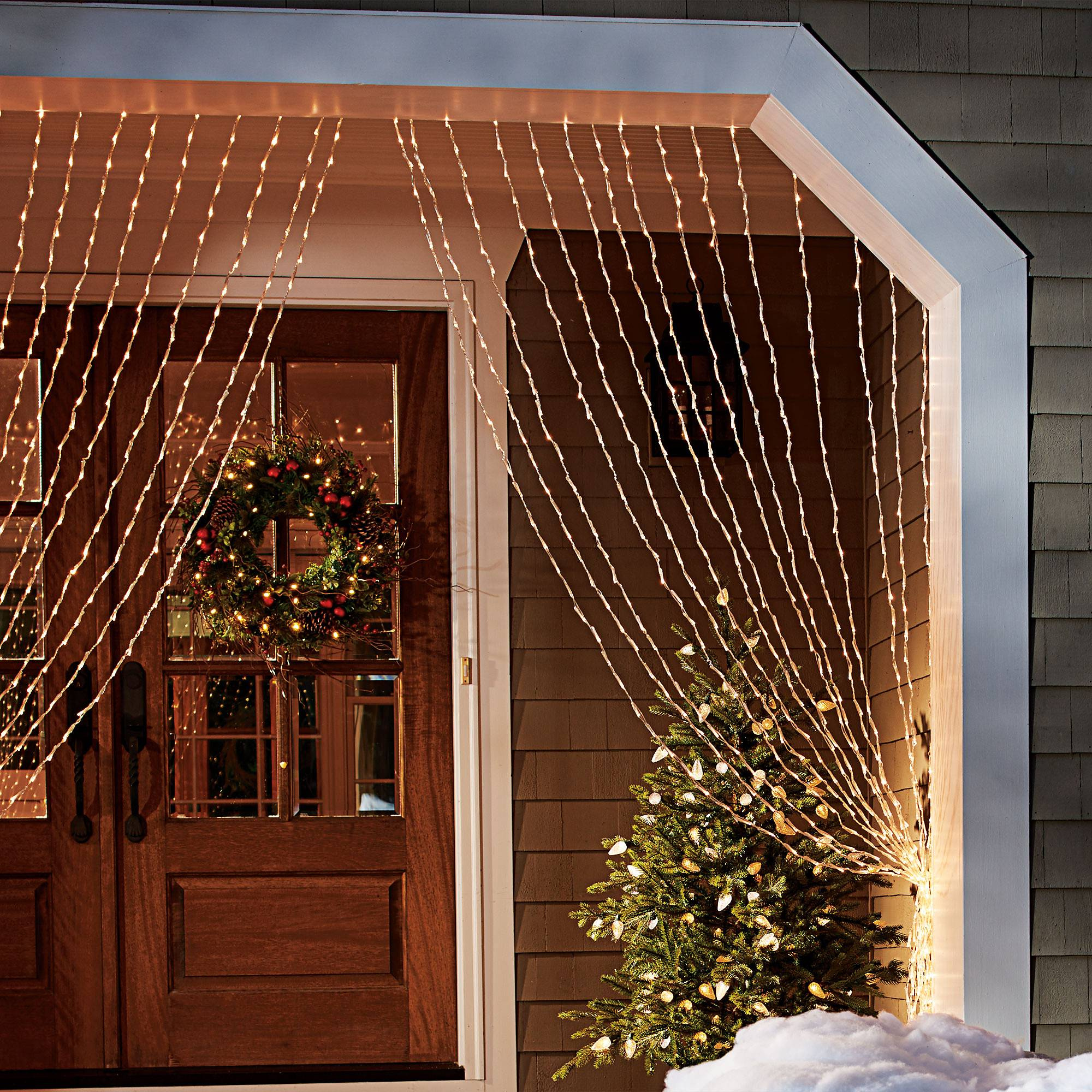 Фотоохота: Новогодняя подсветка загородного дома и сада — 26 идей