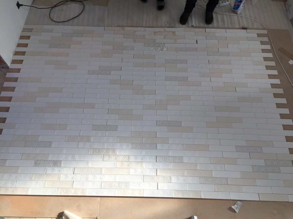 Вопрос: Как выбрать укладчика плитки