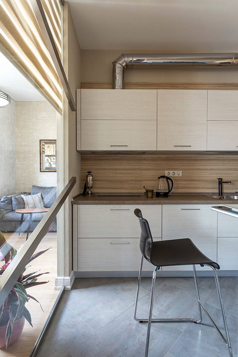 Houzz тур: Квартира со старыми бревнами, кирпичом и телефонной будкой