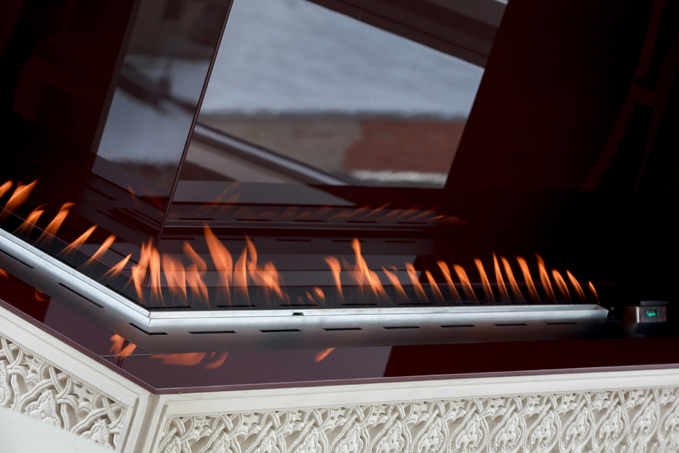 Гостиная с камином, угловой автоматический биокамин Decoflame
