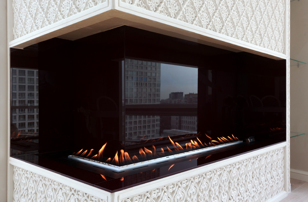 Гостиная с камином, угловой автоматический биокамин Decoflame