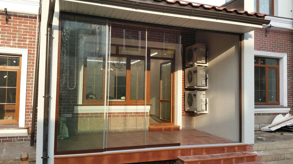 Раздвижное безрамное остекление террасы SF20  от SUNFLEX Германия