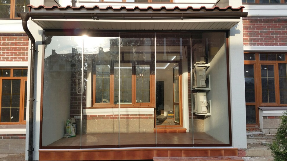 Раздвижное безрамное остекление террасы SF20  от SUNFLEX Германия