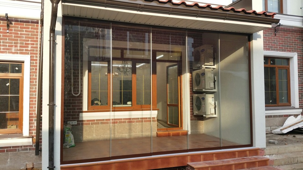 Раздвижное безрамное остекление террасы SF20  от SUNFLEX Германия