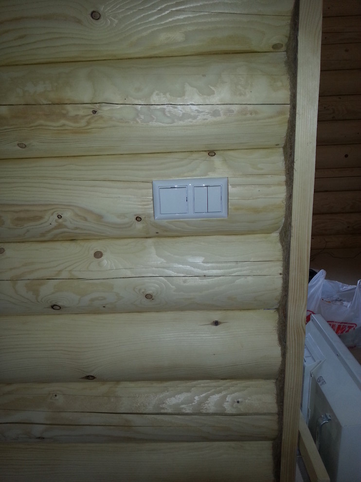 Электромонтажные работы в домах из оцилиндрованного бревна.