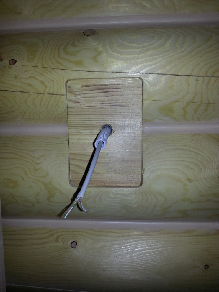 Электромонтажные работы в домах из оцилиндрованного бревна.