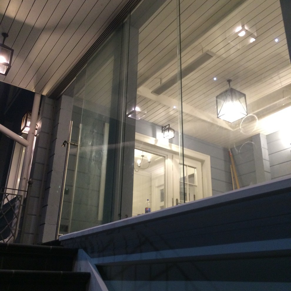 Раздвижное безрамное остекление террасы от SUNFLEX Германия