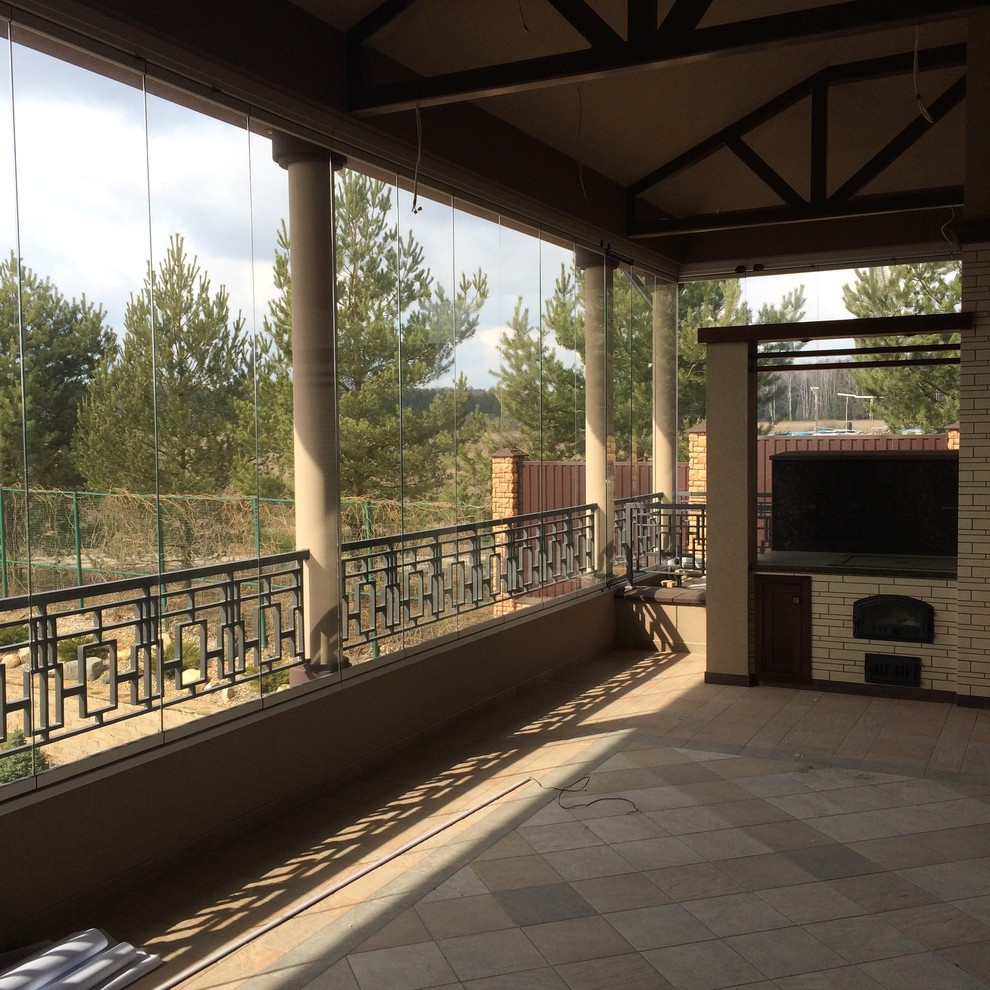 Складное остекление террасы от SUNFLEX Германия