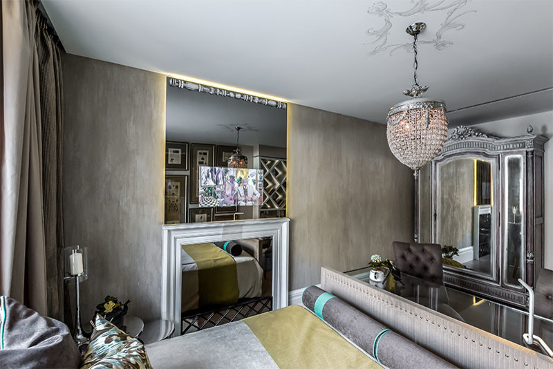 Телевизор над камином