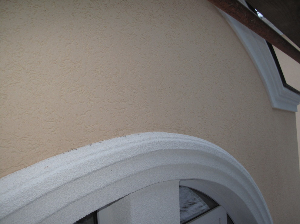 Дом утеплён пенополистиролом EIFS, декоративная штукатурка Ceresit