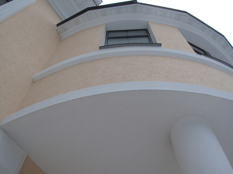 Дом утеплён пенополистиролом EIFS, декоративная штукатурка Ceresit