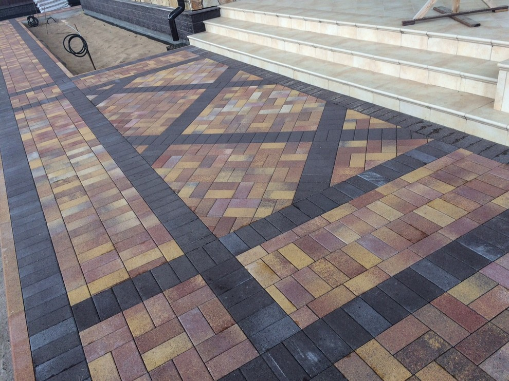 Мощение тротуарной плиткой