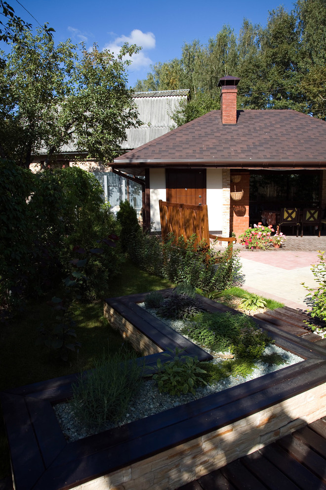 Беседка в стиле Шале на участке коттеджа