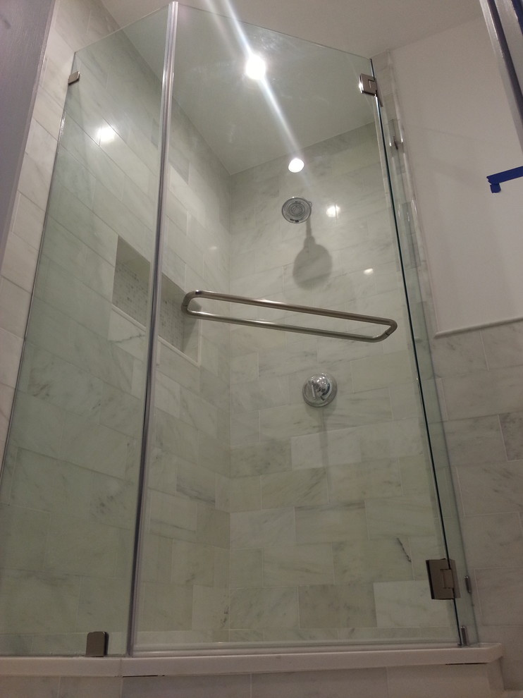 Frameless shower enclosures