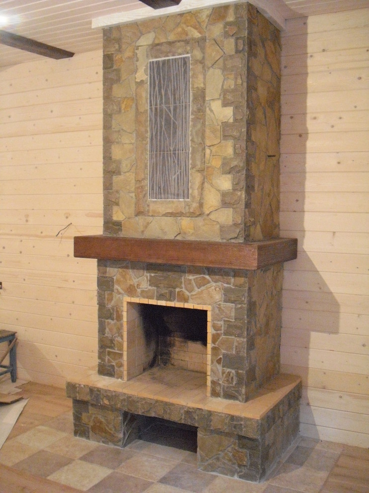 Камин с облицовкой камнем