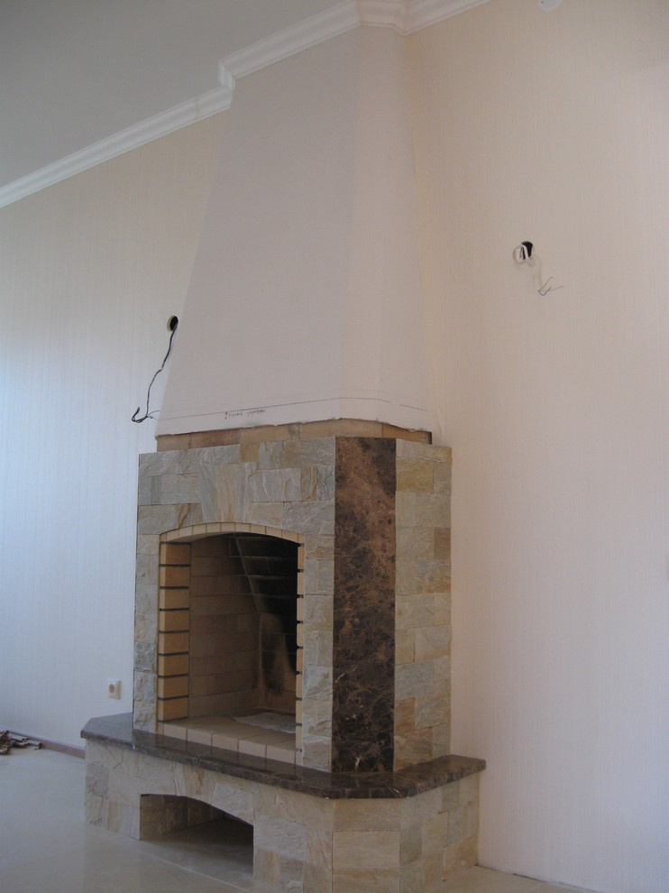 Камин с облицовкой камнем