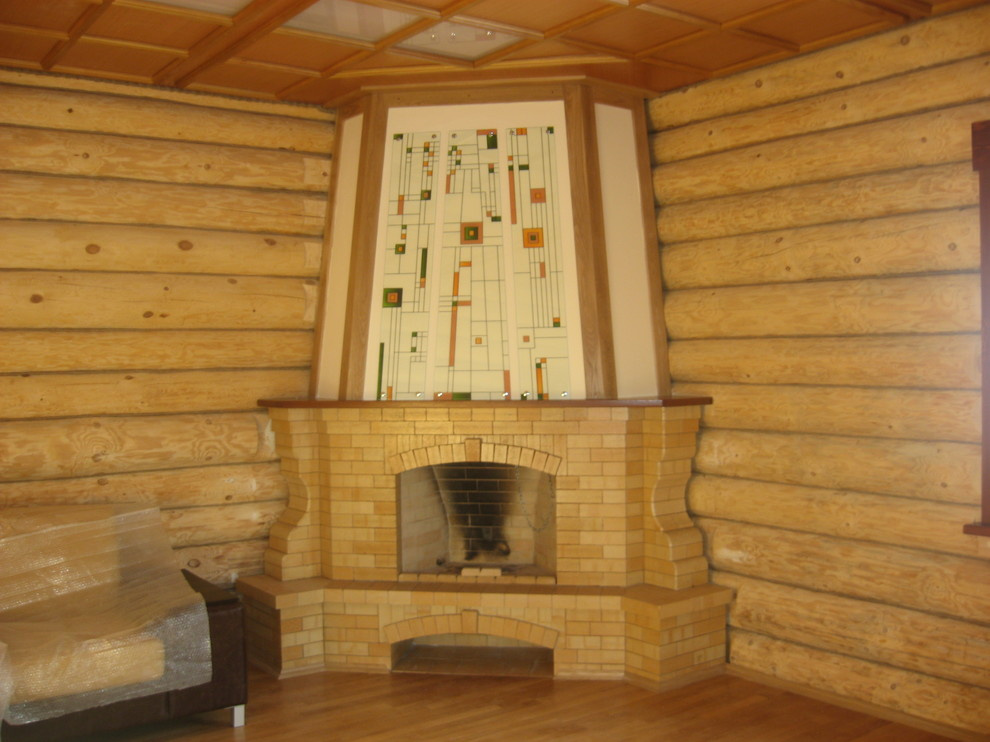 Камин угловой из кирпича в деревянном доме