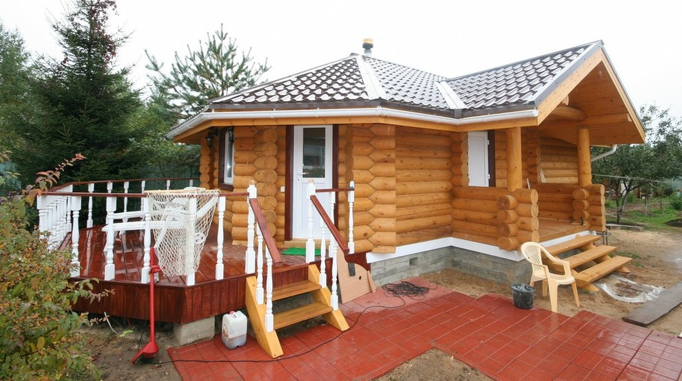 Баня из оцилиндрованного бревна "Песня"