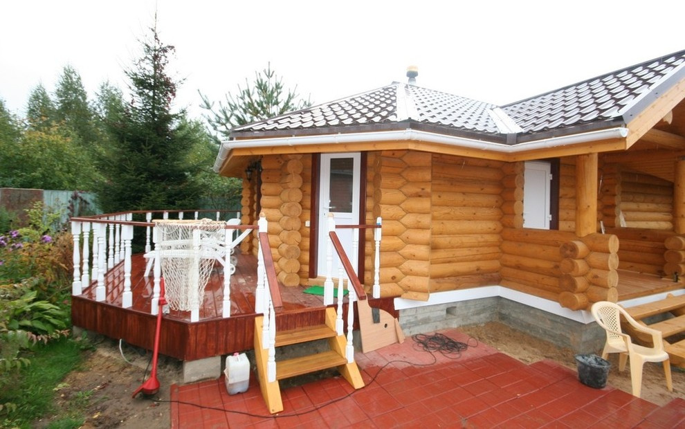 Баня из оцилиндрованного бревна "Песня"