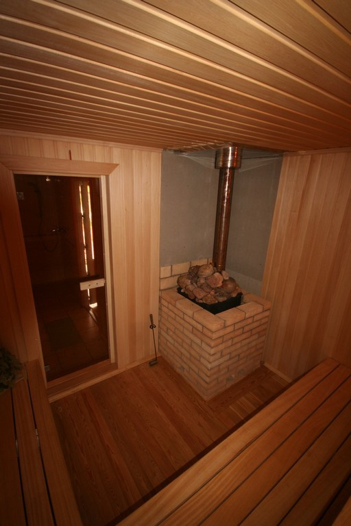 Баня из оцилиндрованного бревна "Песня"