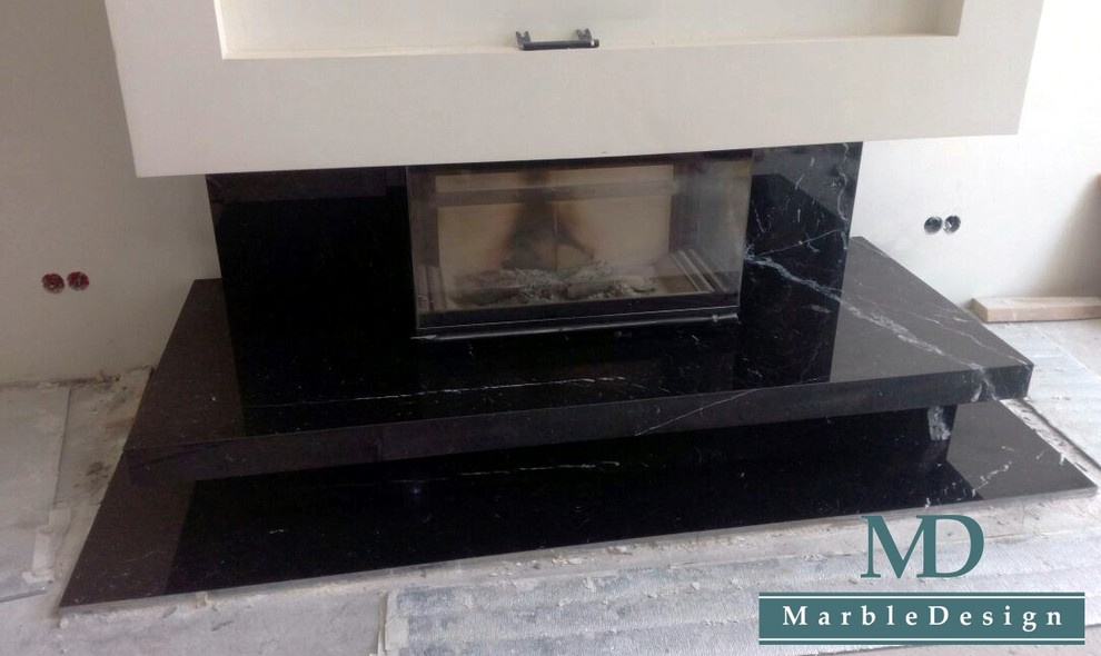 Обложка проекта: Облицовка камина мрамором Неро Марквина