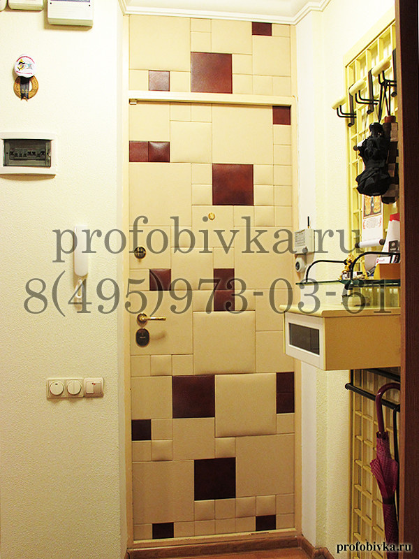 Дизайнерская отделка входной двери натуральной кожей