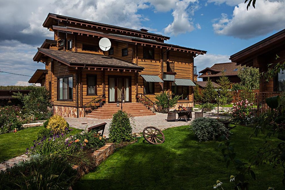 Проект загородного дома из бруса в стиле кантри "Родовое гнездо"