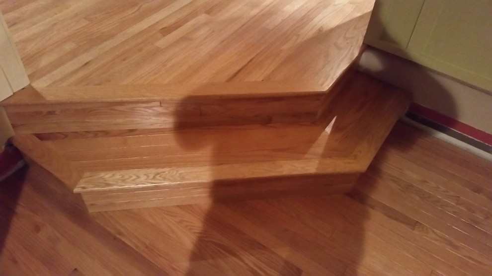 Install 2 1/4 prefinish red oak